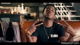 GIF eines Mannes, der vorgibt, eine Schere zu haben